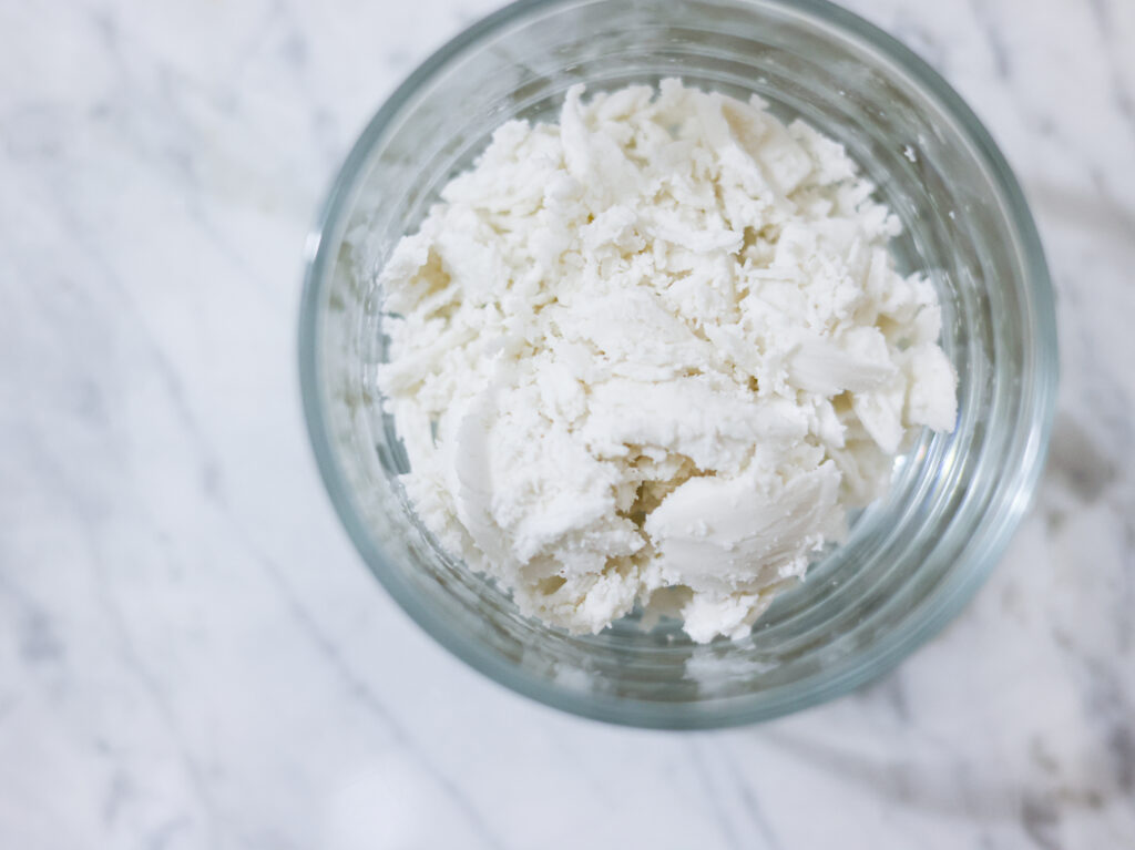 In this photo, you can see an açai bowl ingredients such as whipped coconut cream