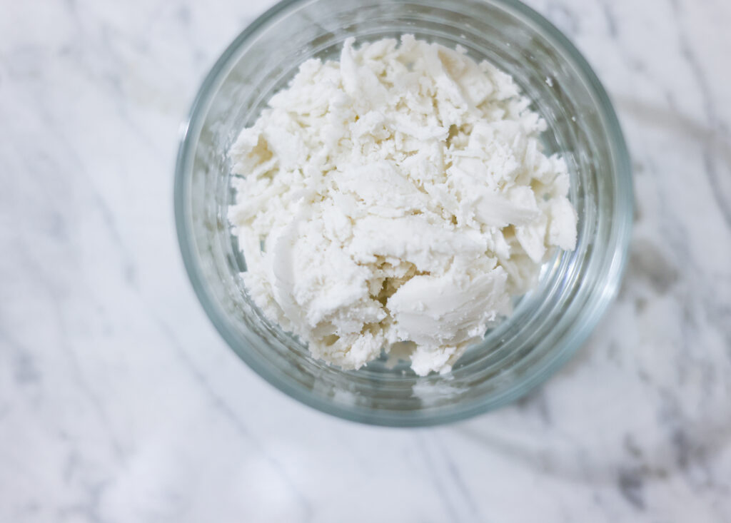 In this photo, you can see an açai bowl ingredients such as whipped coconut cream