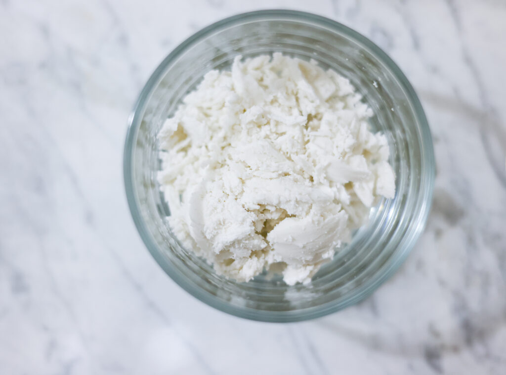 In this photo, you can see an açai bowl ingredients such as whipped coconut cream