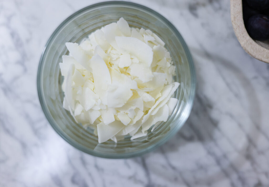 In this photo, you can see an açai bowl ingredients such as shredded coconut