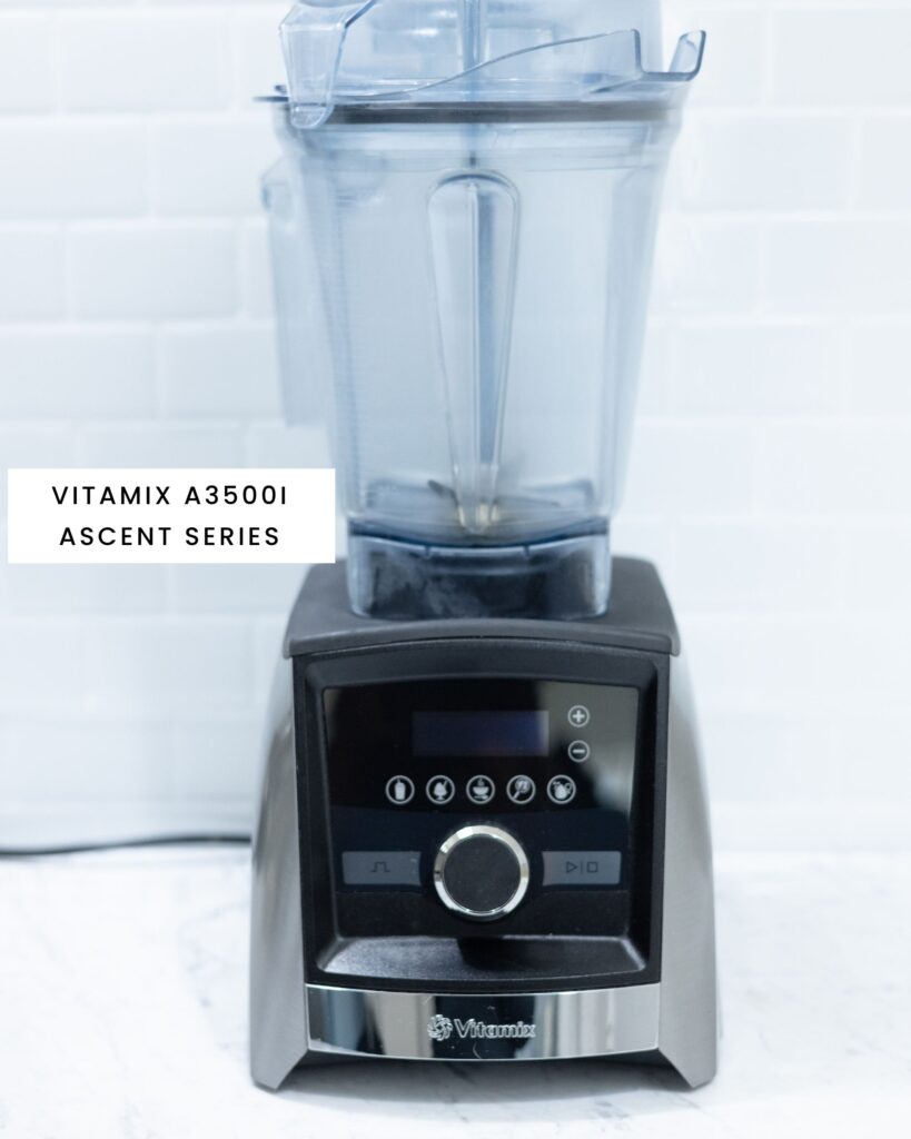 In the picture you can see a blender from the high-end brand vitamix A3500i Ascent Series in the back a metro tiles, and it's situated on carrara marble countertop