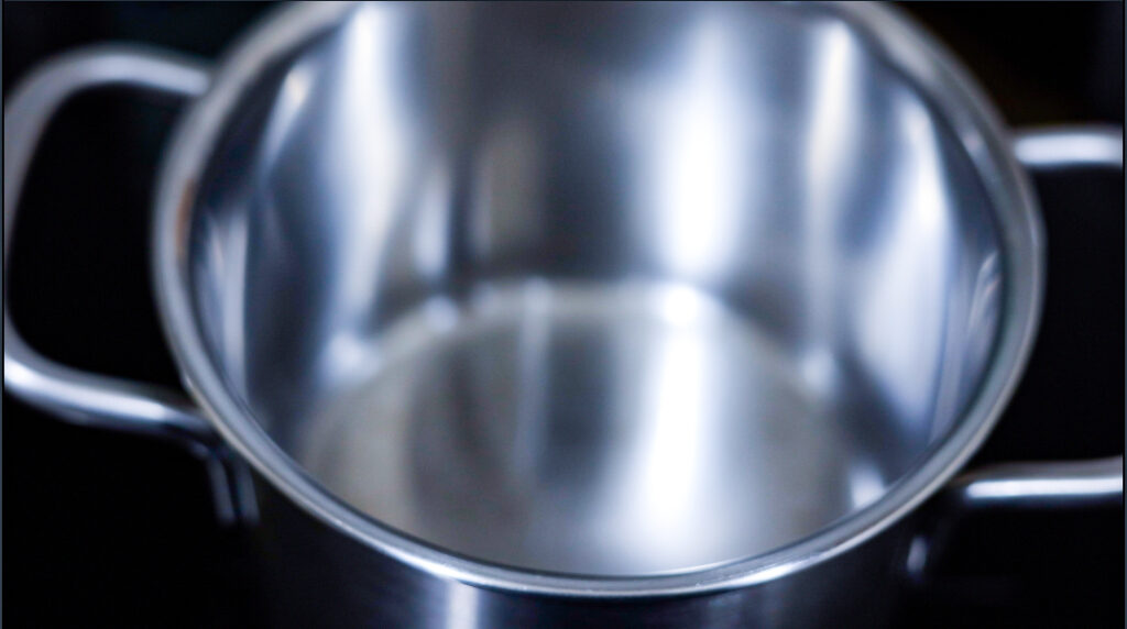 In this picture you can see a silver stainless steel pot