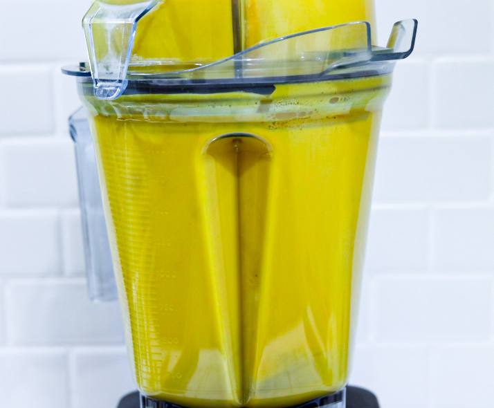 In this picture you can see Turmeric milk Ayurveda in a vitamix container. All ingredients will be blended together for 30 seconds