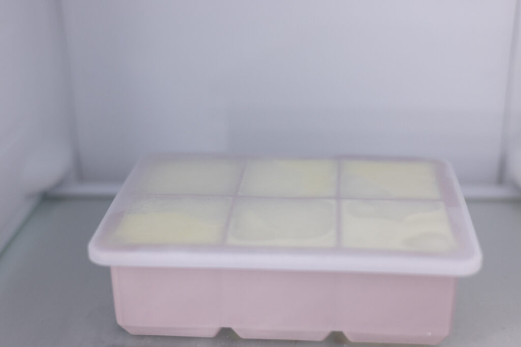 This picture shows oat milk ice cubes frozen in the freezer