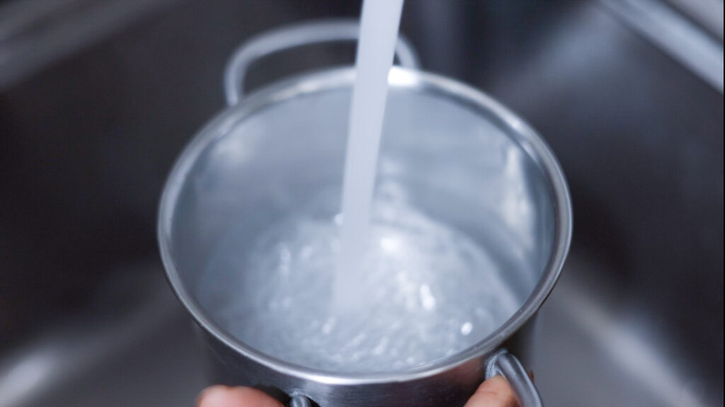 In this picture you can see water being poured into the pot