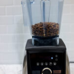 In this picture you can see coffee beans in a Vitamix blender