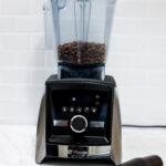 In this picture you can see coffee beans in a Vitamix blender