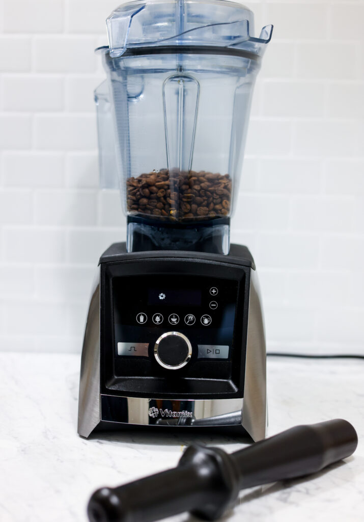 In this picture you can see coffee beans in a Vitamix blender