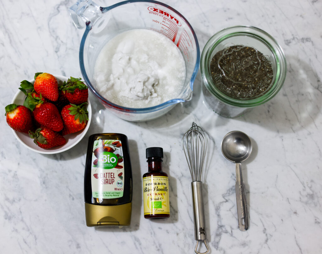 In this picture you can see all ingredients for Strawberry Chia Pudding