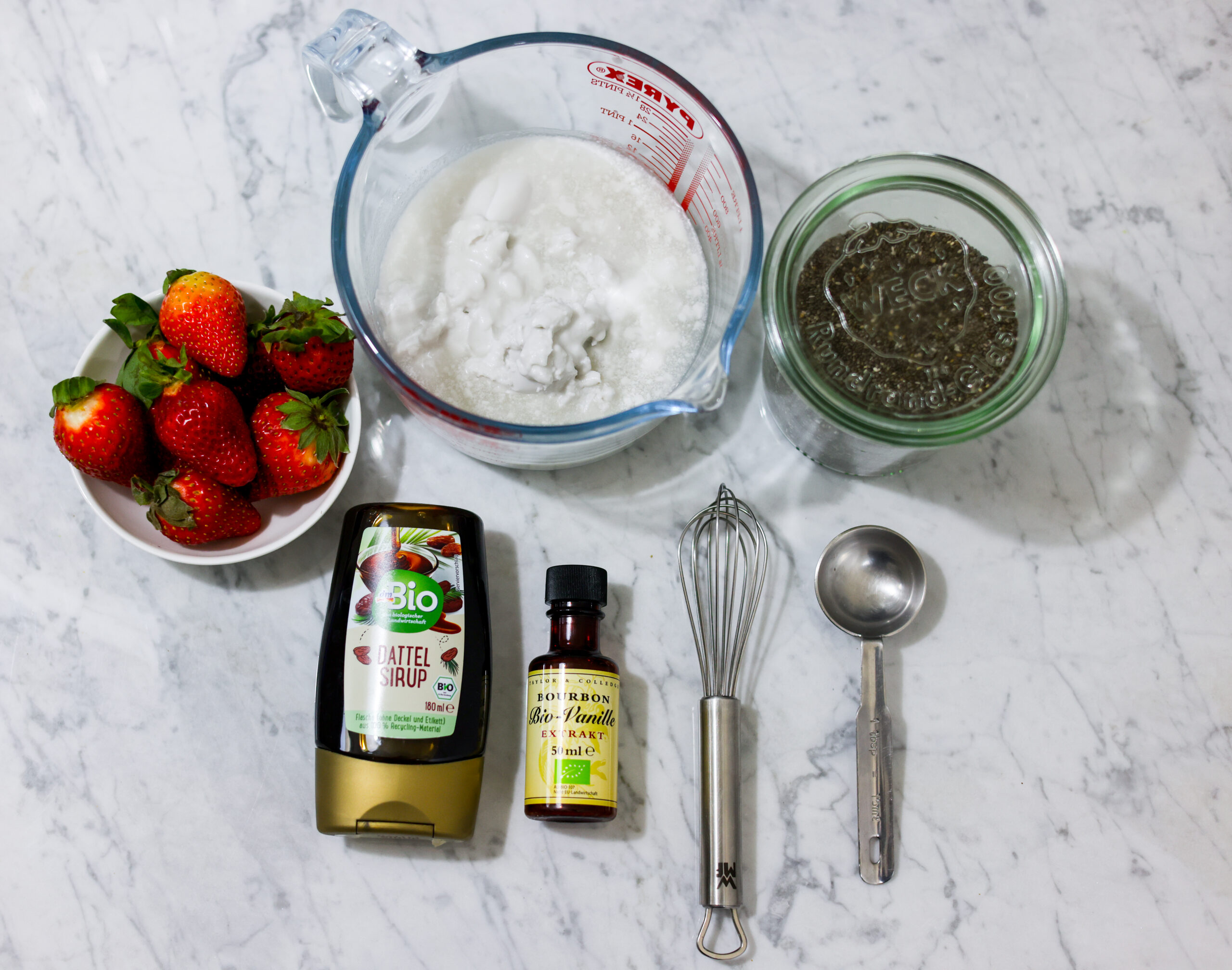 In this picture you can see all ingredients for Strawberry Chia Pudding