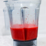 In this picture you can see The Vitamix container contains organic strawberries, which are puréed