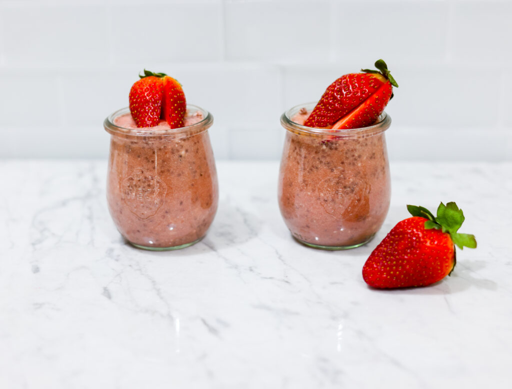 In this picture you can see two Strawberry Chia Puddings