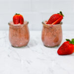 In this picture you can see two Strawberry Chia Puddings