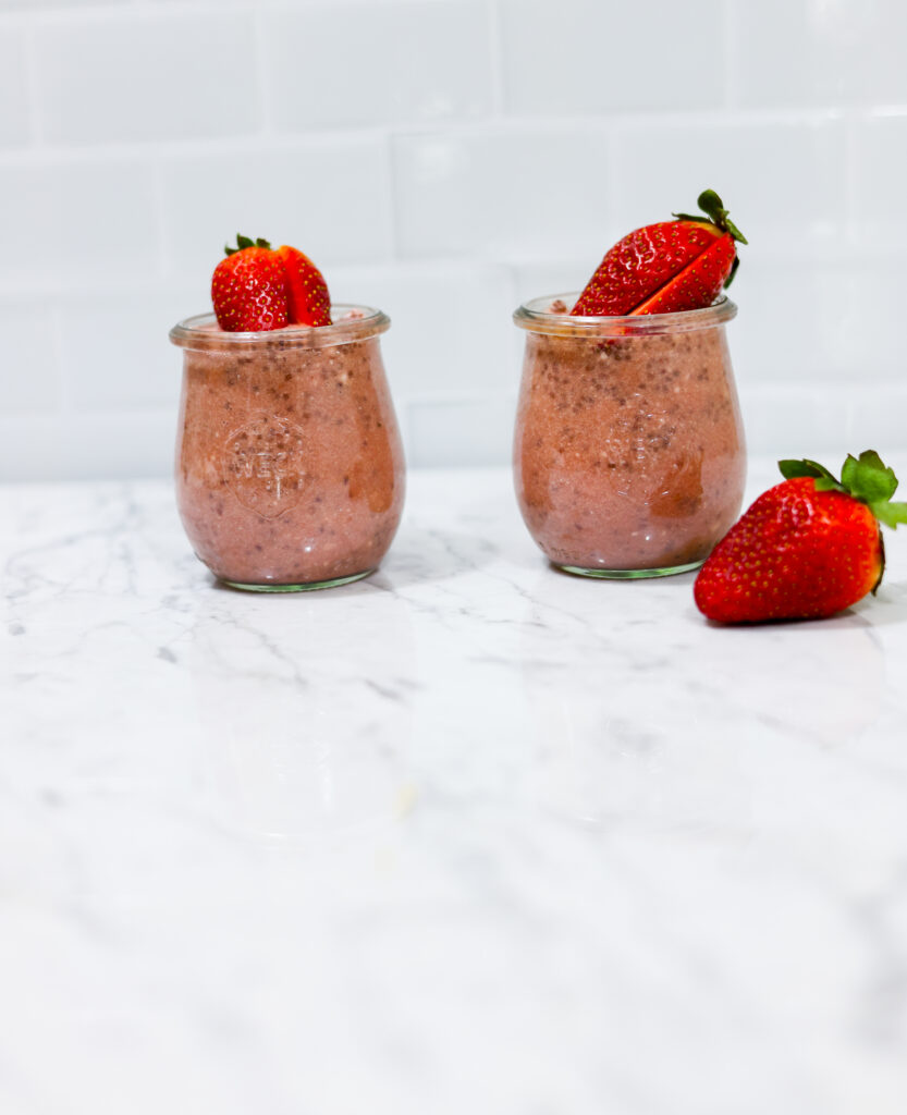 In this picture you can see two Strawberry Chia Puddings