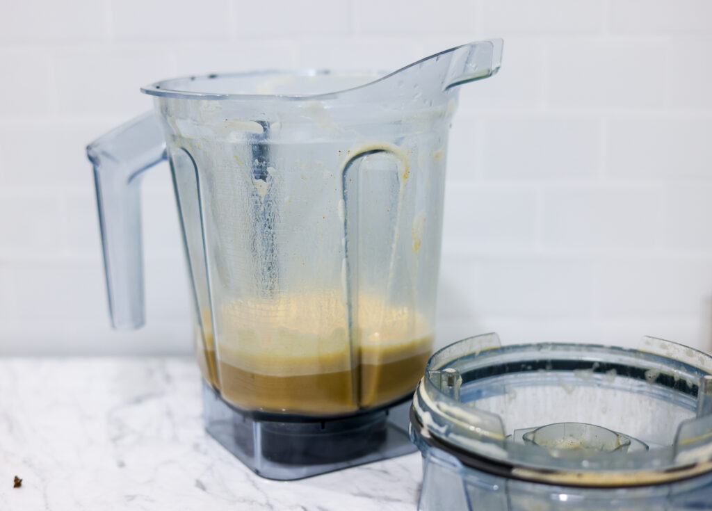 You can see a vitamix container filled with PUMPKIN SPICE LATTE DAIRY-FREE RECIPE