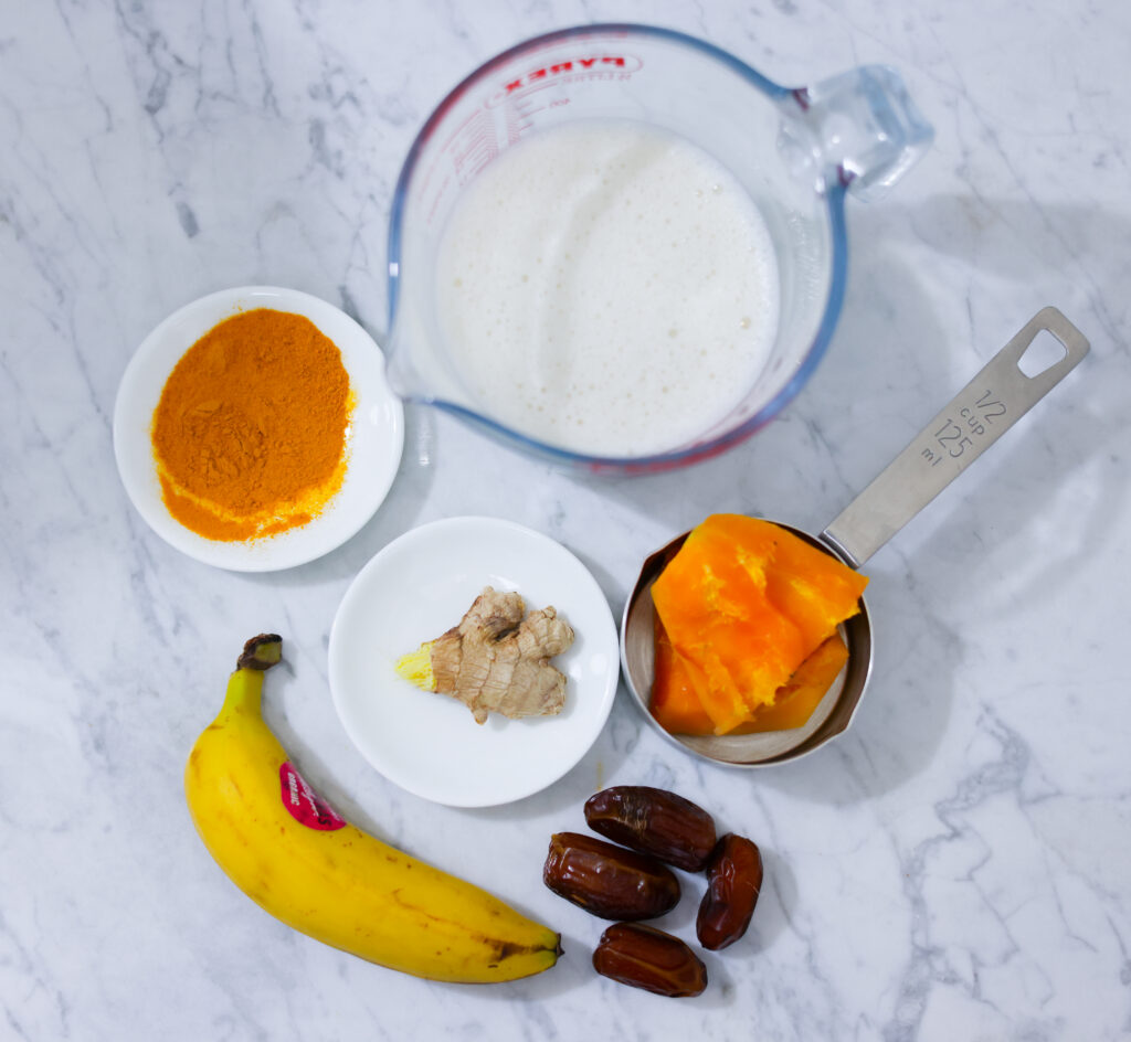 In this picture you can see a Turmeric Papaya Smoothie