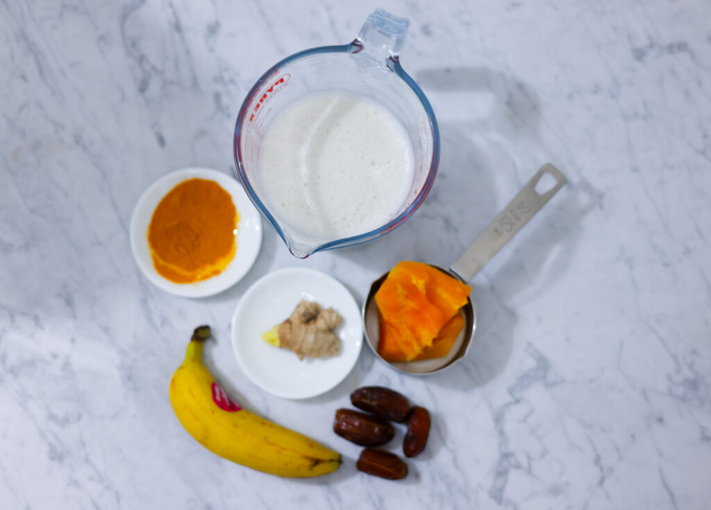 In this picture you can see a Turmeric Papaya Smoothie