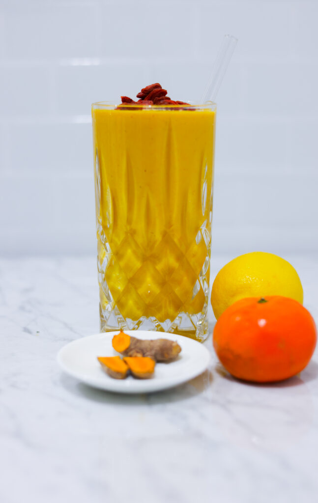 In this picture you can see a Turmeric Papaya Smoothie