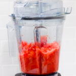 In this picture you can see The Vitamix container contains organic strawberries, which are puréed