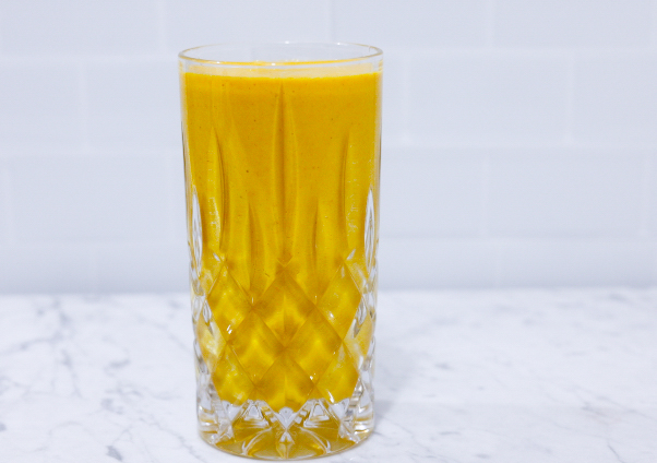 In this picture you can see a Turmeric Papaya Smoothie