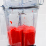 In this picture you can see The Vitamix container contains organic strawberries, which are puréed