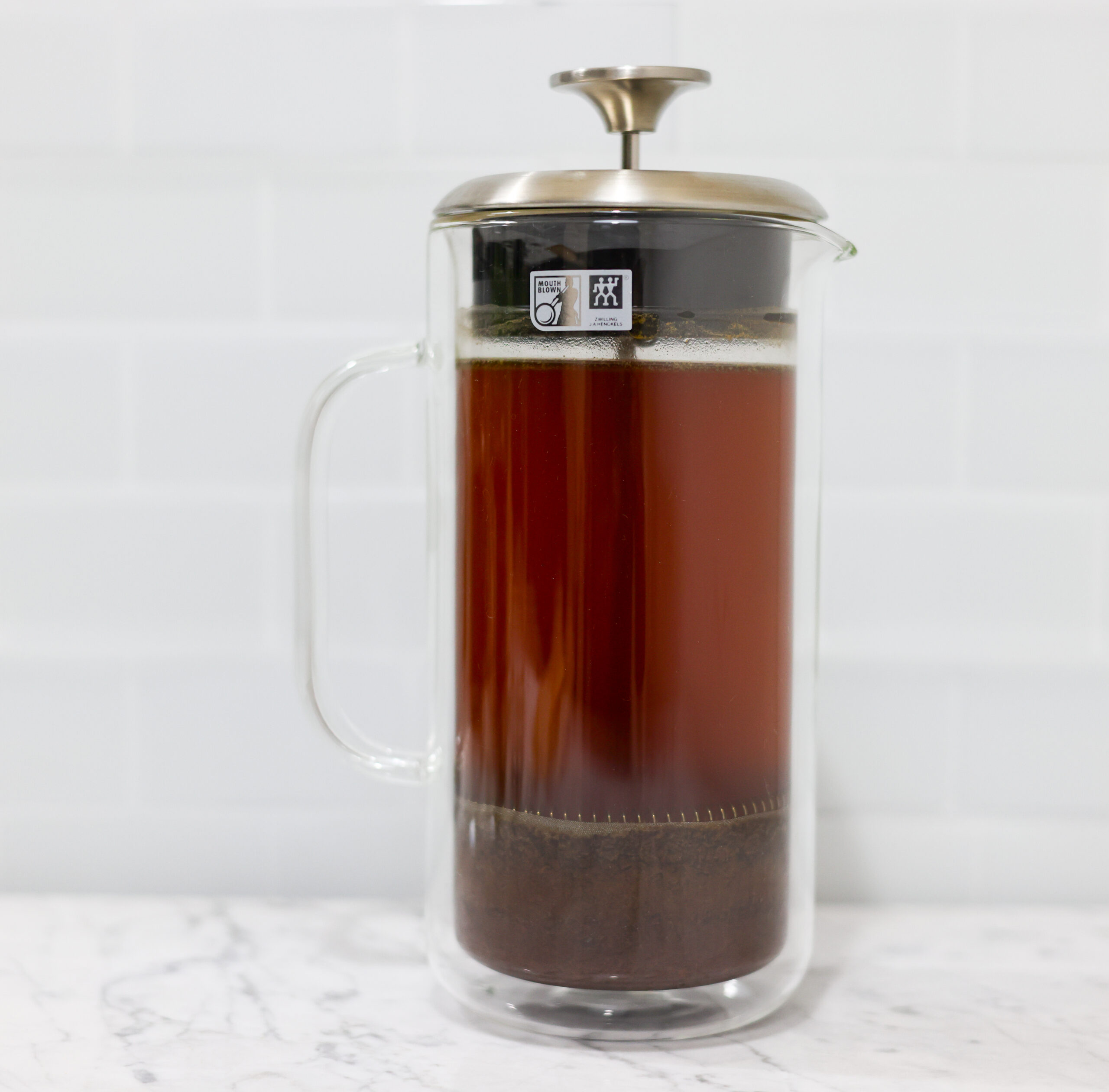 In this picture you can see a French press by the brand Zwilling filled with cold-brewed coffee