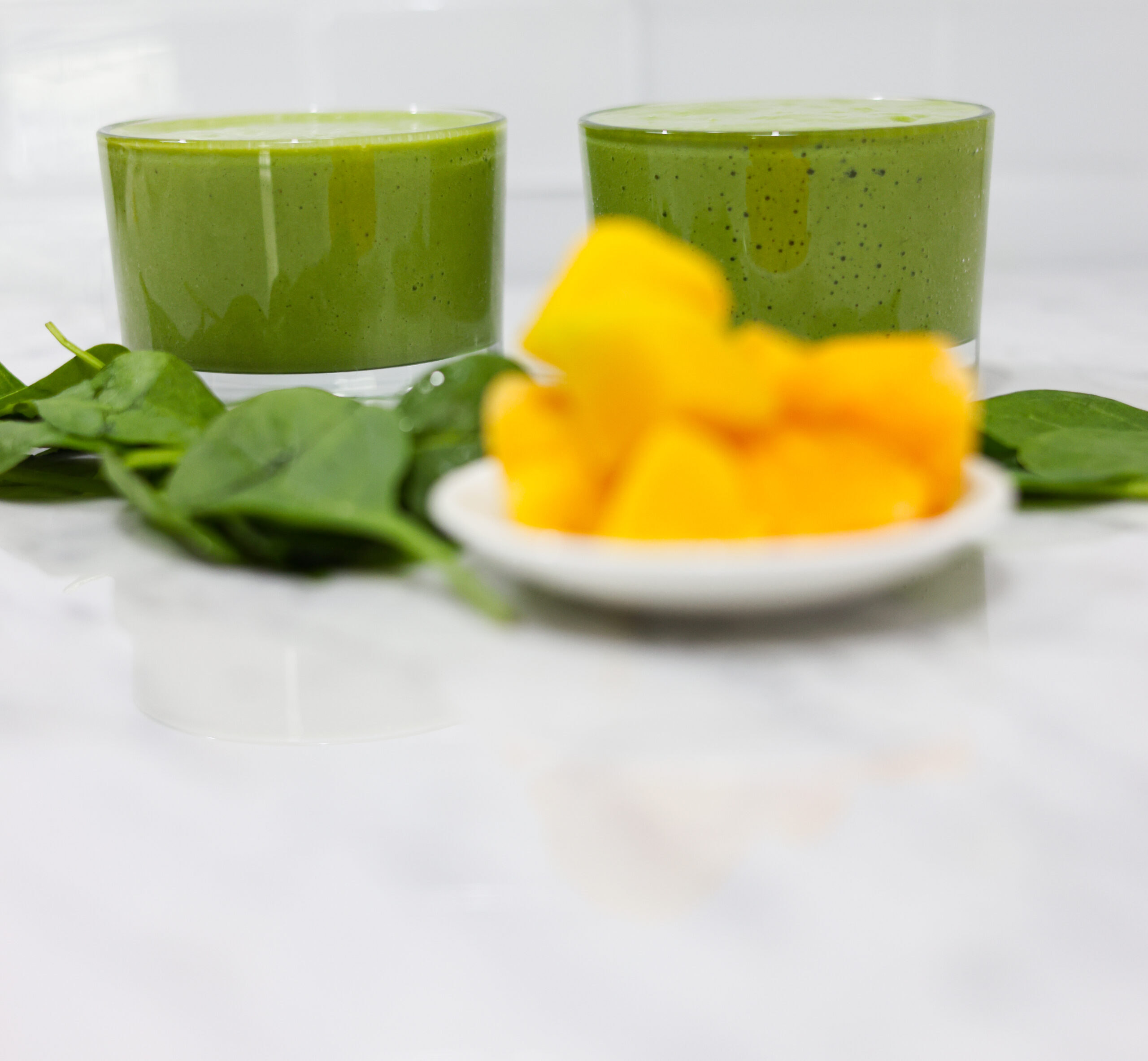 The Power of Pulp: Mango Spinach Smoothie Experience the magic of blending health and taste with our Mango Spinach Smoothie. It's the perfect recipe to boost your nutritional intake, packed with the antioxidant and vitamin-rich benefits of mango and spinach. Enjoy it as it is or whip it up in a Vitamix blender for an impeccable taste. It's the smoothie you've been missing out on! Find the recipe: https://thefiercelifestyle.com/mango-spinach-smoothie/